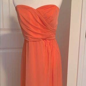 David Bridal’s peach/orange bridesmaid dress size 18.